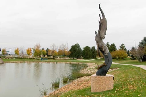 Bronze River Otters Sculpture - Swift Pursuit-monument-1